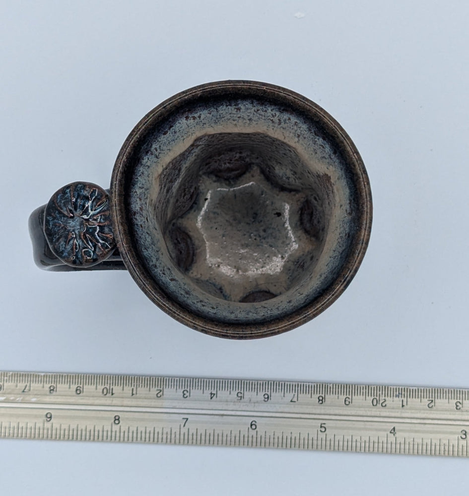 Small Artisan Handcrafted Coffee Mug with Unique Embossed Details and Rich Glaze
